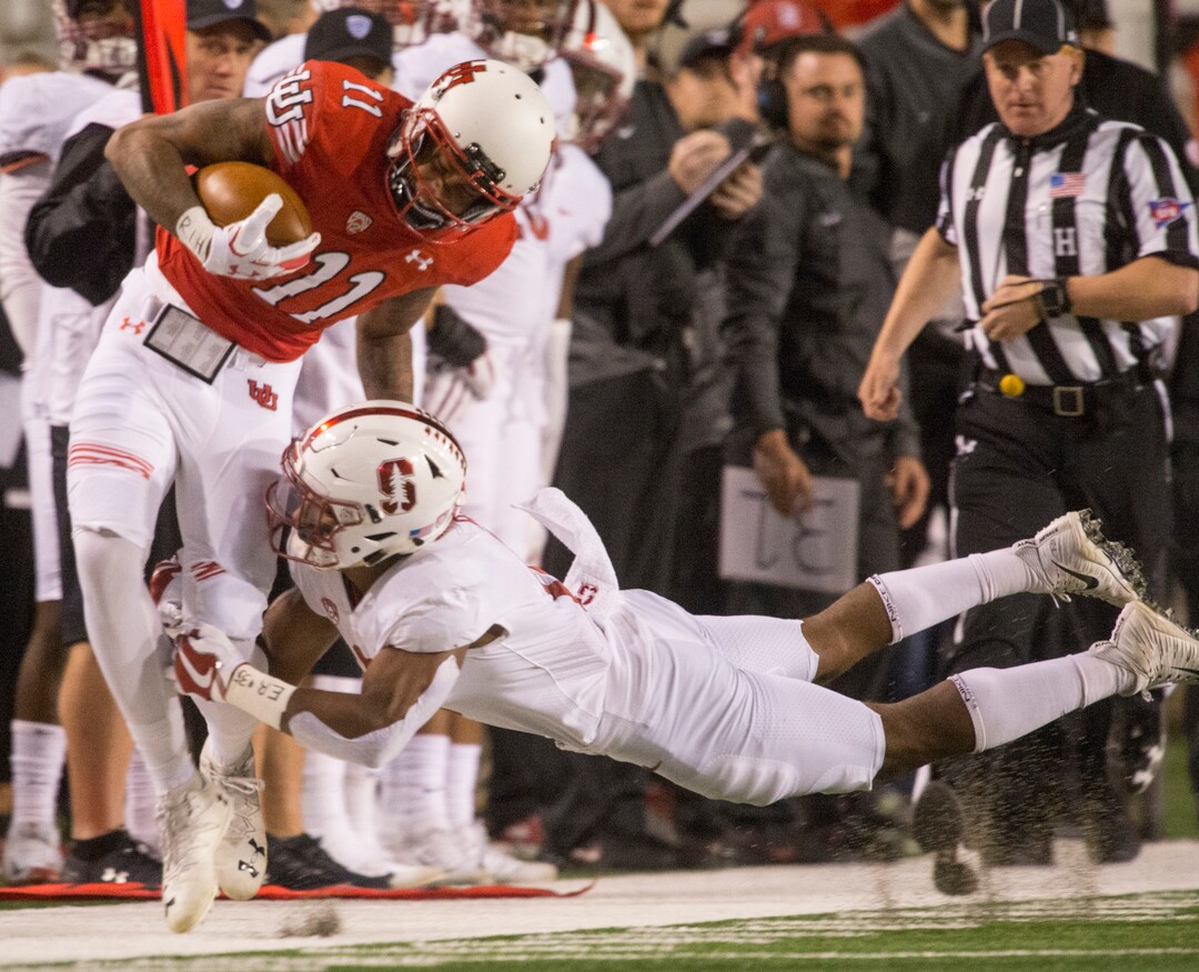 (Rick Egan  |  The Salt Lake Tribune)Utah Utes wide receiver Raelon Singleton (11) is brought down by Stanford Cardinal safety Justin Reid (8), in PAC-12 football action, Utah Utes vs. Stanford Cardinals, at Rice-Eccles Stadium, Saturday, October 7, 2017.