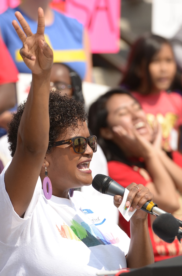 (Leah Hogsten  |  The Salt Lake Tribune) Fatima Dirie with the Salt Lake City mayor's office leads the crowd in a chant. Hundreds of "We are Dreamers," a Utah pro-Deferred Action for Childhood Arrival (DACA) group, marched in solidarity from the Utah Federal Building to the State Capitol with undocumented immigrants who will be affected by the end of DACA.