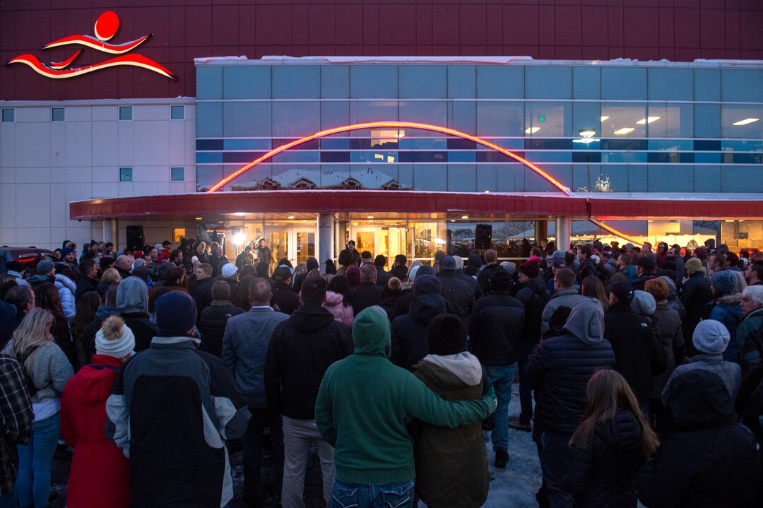 (Rick Egan  |  The Salt Lake Tribune)      Friends and loved ones of David Stokoe gather for a candlelight vigil at the RanLife Home Loans building where he worked in Sandy, Monday, Jan. 21, 2019.