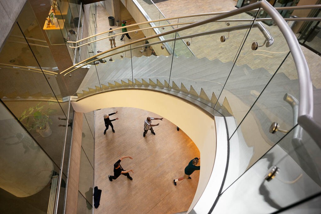 (Trent Nelson | The Salt Lake Tribune)  A group of homeless people practice tai chi at the Main Library in Salt Lake City on Wednesday April 3, 2019.