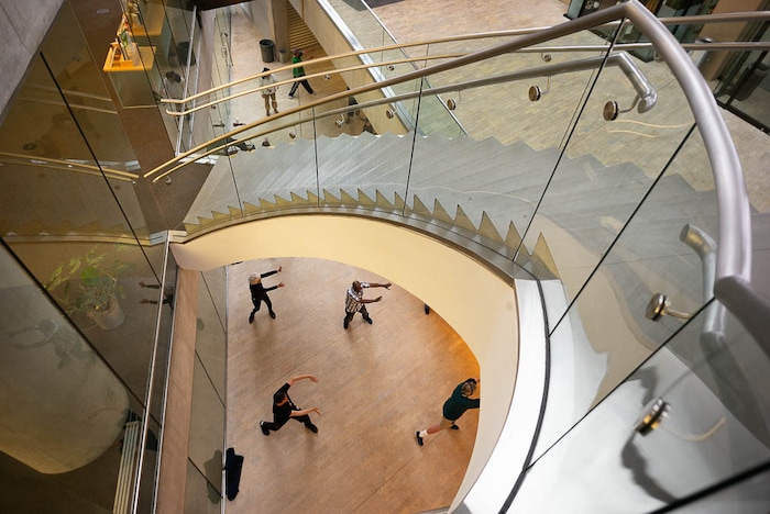 (Trent Nelson | The Salt Lake Tribune)  
A group of homeless people practice tai chi at the Main Library in Salt Lake City on Wednesday April 3, 2019.