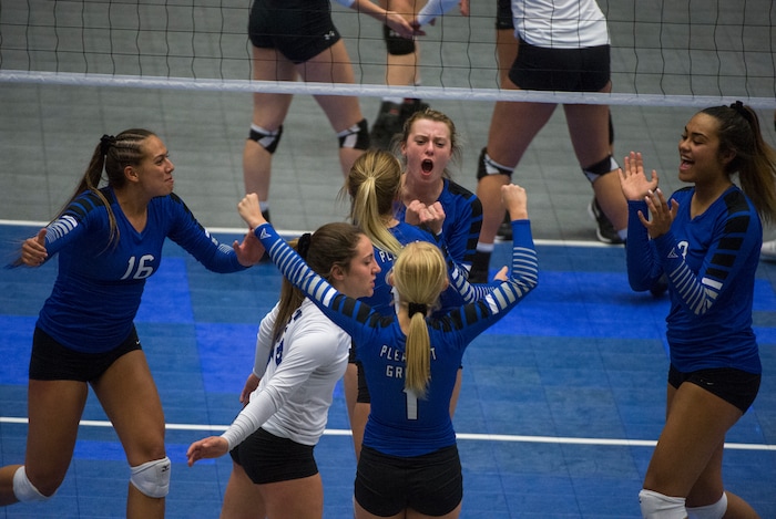 (Rick Egan  |  The Salt Lake Tribune)  The Pleasant Grove Vikings celebrate as they lead Lone Peak  in championship volleyball action, Pleasant Grove vs. Lone Peak, at Utah Valley University, Saturday, November 4, 2017.