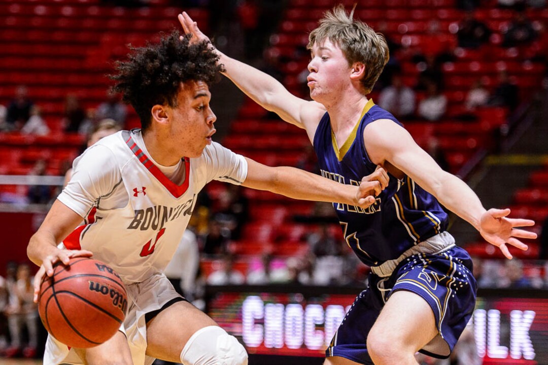(Trent Nelson | The Salt Lake Tribune)  Skyline vs. Bountiful, 5A State high school basketball tournament at the Huntsman Center in Salt Lake City, Wednesday Feb. 28, 2018. Bountiful's Isaac Kime (0) and Skyline's Adrian Wilde (4).