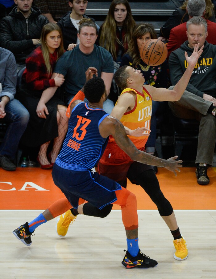 (Francisco Kjolseth  |  The Salt Lake Tribune)   Oklahoma City Thunder forward Paul George (13) pressures Utah Jazz guard Dante Exum (11) in the NBA game at Vivint Smart Home Arena Sat., Dec. 22, 2018, in Salt Lake City.