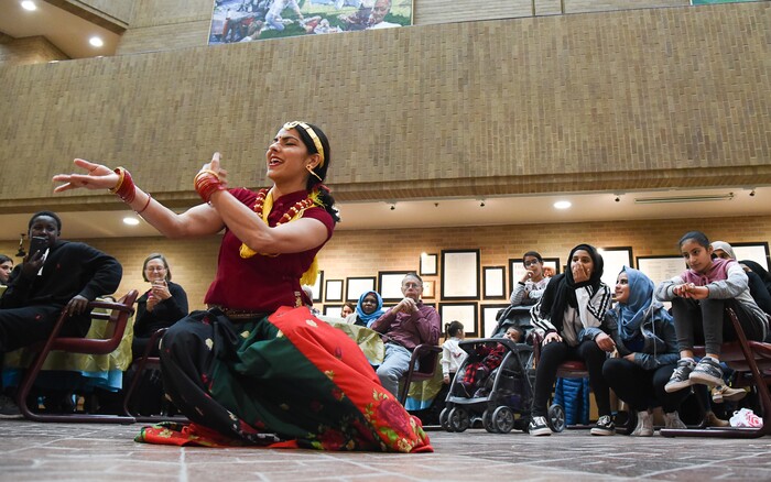 (Francisco Kjolseth  |  The Salt Lake Tribune)  Anju Thapaliya Sharma performs a dance during the Women of the World 8th annual award ceremony at the Salt Lake County building in Salt Lake City on Saturday, Dec. 8, 2018, as a celebration of successes including educational, service, and employment milestones by refugee women.