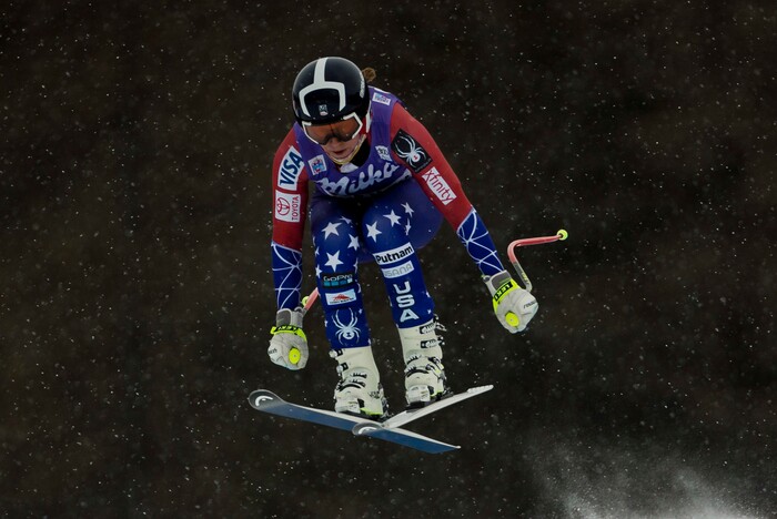 United States' Alice McKennis goes airborne during a training session of the alpine skiing, women's World Cup downhill in Cortina d'Ampezzo, northern Italy, Wednesday, Jan. 17, 2018. (AP Photo/Domenico Stinellis)