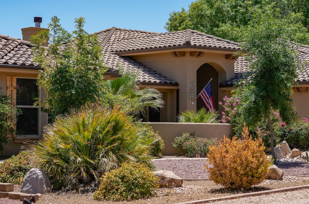 (Francisco Kjolseth  |  The Salt Lake Tribune) Water-efficient landscapes are mixed in with traditional grass lawns in St. George on Tuesday, June 11, 2024.