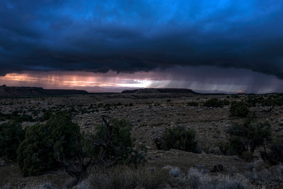(Bonnie Jo Mount | The Washington Post) Cloud cover and rainfall in the Circle Cliffs region, an area removed from Grand Staircase - Escalante National Monument, in Garfield County, Utah on October 11, 2018.