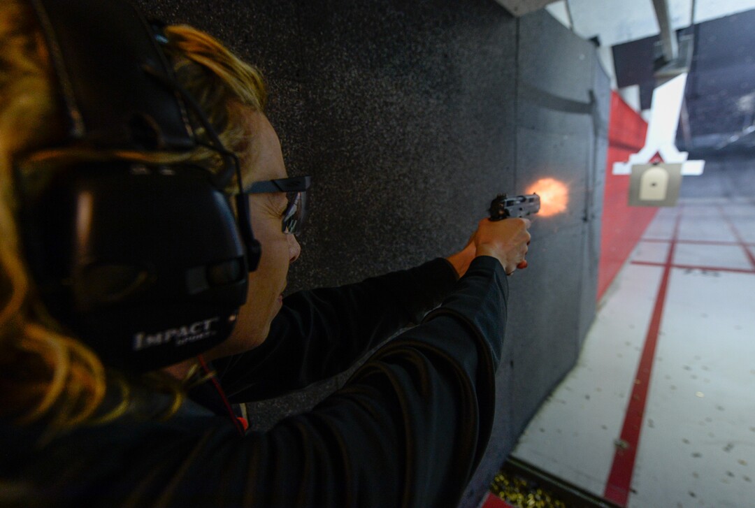 (Francisco Kjolseth  |  The Salt Lake Tribune)  Tiffany Sowder of Morgan shoots a 9mm at The Gun Vault shooting range in South Jordan. Sowder is part of The Well-Armed Woman group which encourages women to conceal carry for safety. Of the concealed carry permits issued by the state, only about one in five is held by a woman.