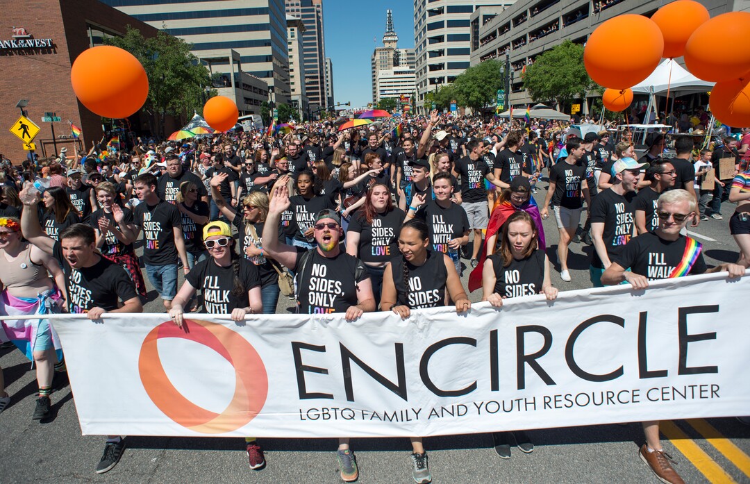 (Rick Egan  |  The Salt Lake Tribune)    Supporters of Encircle march in the Utah Pride Parade,  in Salt Lake City, Sunday, June 3, 2018.