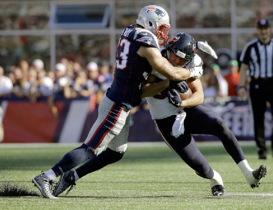 Steven Senne | The Associated Press. New England Patriots linebacker Kyle Van Noy, left, tackles Houston Texans tight end Ryan Griffin during the second half of an NFL football game, Sunday, Sept. 24, 2017, in Foxborough, Mass.