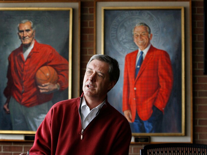 (Scott Sommerdorf  |  Tribune File Photo)  Utah Athletic Director Dr. Chris Hill explains why the decision was made to fire Jim Boylen in the Huntsman Center Lounge in front of the portraits of former Utah basketball coach Vadal Peterson (left) and former Utah Director of Athletics James "Bud Jack. The University of Utah announced that head basketball coach Jim Boylen had been fired, Saturday, March 12, 2011.