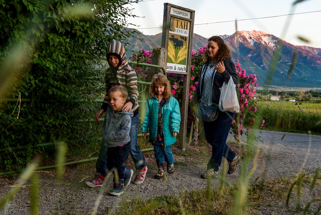 (Leah Hogsten  |  The Salt Lake Tribune) Amy Baird and her children, l-r Jacob, Eliza and Olivia got the chance to see fireflies for the first time in their lives in June. Fireflies have been twinkling in the hay fields of Garcia's family farm, Thompson Century Farm near Spanish Fork, since her great-great-grandfather Samuel Thompson settled the farm in 1800s. The farm and its wet, marshy habitat is perfect for the fireflies' annual mating rituals every year, roughly from late May to early July. Garcia leads tours through her fields for free, simply to share in the experience and to educate others about fireflies, their short-lived lifecycle and what endangers their fragile habitat.