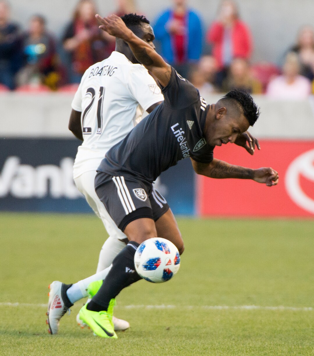 (Rick Egan  |  The Salt Lake Tribune)    Real Salt Lake forward Joao Plata (10) collides with Colorado Rapids defender Bismark Adjei-Boateng (21), as he goes for the ball, in MLS soccer action, RSL vs Colorado Rapids at Rio Tinto Stadium, Saturday, April 21, 2018.