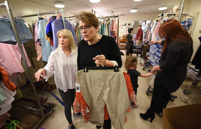 (Francisco Kjolseth  |  The Salt Lake Tribune)  Patricia Wilcox, left, director/choreographer of Pioneer Theater's upcoming musical "Mamma Mia!" is joined by costume designer Brenda Van der Wiel in the costume shop during a recent fitting. The cast and crew have spent years juggling schedules to balance mothering and professional work. 