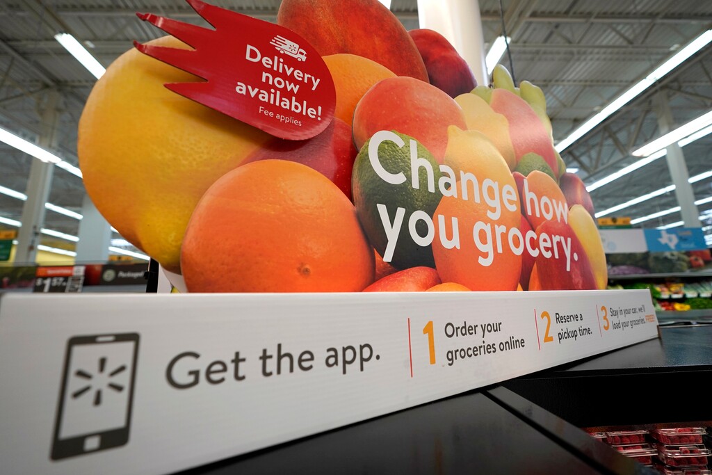 (David J. Phillip | AP photo)

In this Nov. 9, 2018, photo, a sign promotes online and home delivery of groceries at a Walmart Supercenter in Houston.