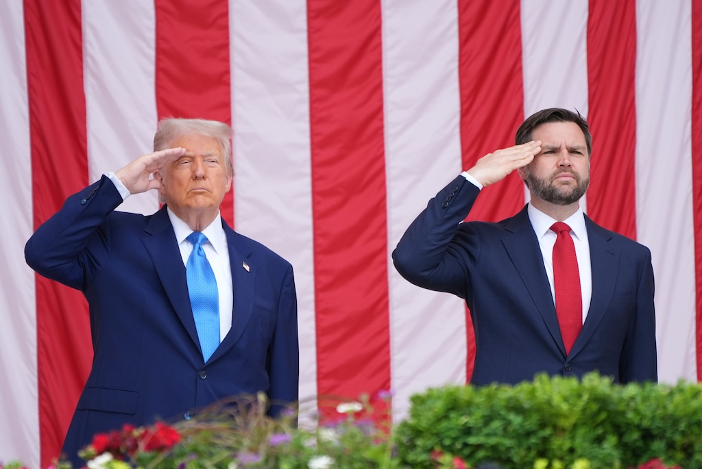 President Donald Trump and Vice President JD Vance salute during the 157th National Memorial Day Observance at Arlington National Cemetery, Monday, May 26, 2025, in Arlington, Va. (AP Photo/Jacquelyn Martin)