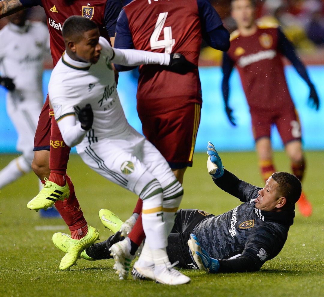 (Francisco Kjolseth  |  The Salt Lake Tribune)  Real Salt Lake goalkeeper Nick Rimando (18) chases down a ball as Real Salt Lake and the Portland Timbers play in their first MLS playoff game at Rio Tinto Stadium in Sandy, Utah on Saturday, Oct. 19, 2019.