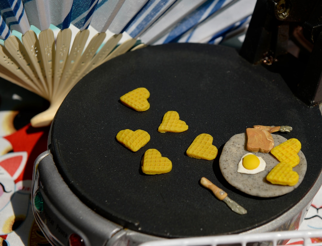 (Leah Hogsten  |  The Salt Lake Tribune) Imogen Nesse, 9, of Salt Lake City creates reproductions of food, including sushi, fudgesicles, cupcakes and heart-shaped waffles out of polymer clay at Craft Lake CityÕs DIY Festival Kid Row, where children 14 and under make and sell their products. Craft Lake CityÕs DIY Festival is UtahÕs largest local, three day arts festival with over 300 artisans, DIY engineers, vintage vendors and craft food creators.