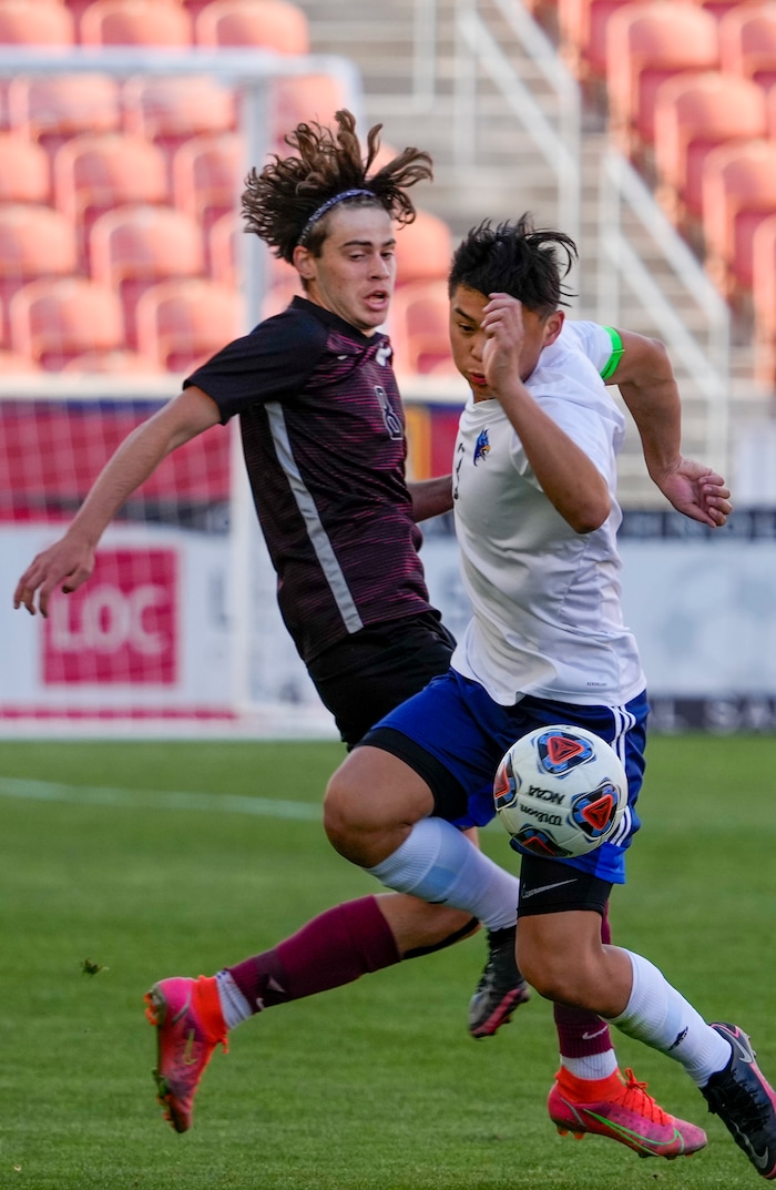 (Leah Hogsten | The Salt Lake Tribune) Layton's Danilo Obradovic collides with Real's Paul Kim as Real Salt Lake Academy meets Layton Christian Academy for the 3A State Soccer Championship title at Rio Tinto Stadium, Wednesday, May 11, 2022. Layton Christian Academy won the title 4-0. 