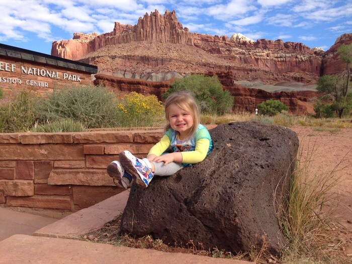 (Erin Alberty | The Salt Lake Tribune) The writer's daughter, Saskia, does "The Waterpocket Fold" outside the visitors center Oct. 4, 2015 at Capitol Reef National Park.