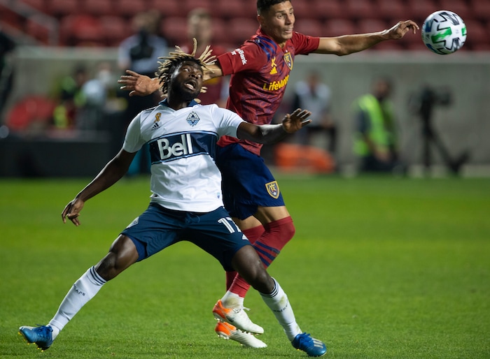 (Rick Egan  |  The Salt Lake Tribune)  Real Salt Lake midfielder Damir Kreilach (8) goes for the ball along with Vancouver Whitecaps forward Cristian Dajome (11), in MLS soccer action between Real Salt Lake and the Vancouver Whitecaps at Rio Tinto Stadium on Saturday, Sept. 19, 2020.

 