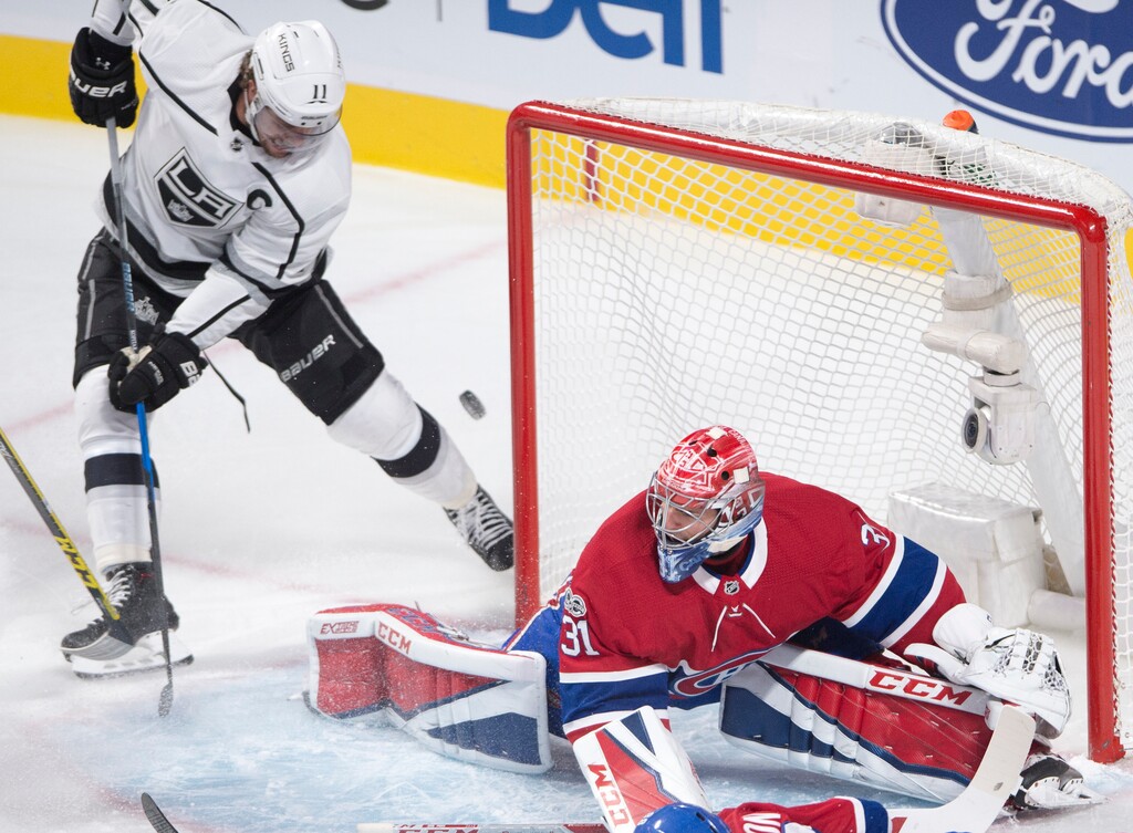 Los Angeles Kings center Anze Kopitar (11) is stopped by Montreal Canadiens goalie Carey Price (31) during the first period of an NHL hockey game, Thursday, Oct. 26, 2017 in Montreal. (Ryan Remiorz/The Canadian Press via AP)