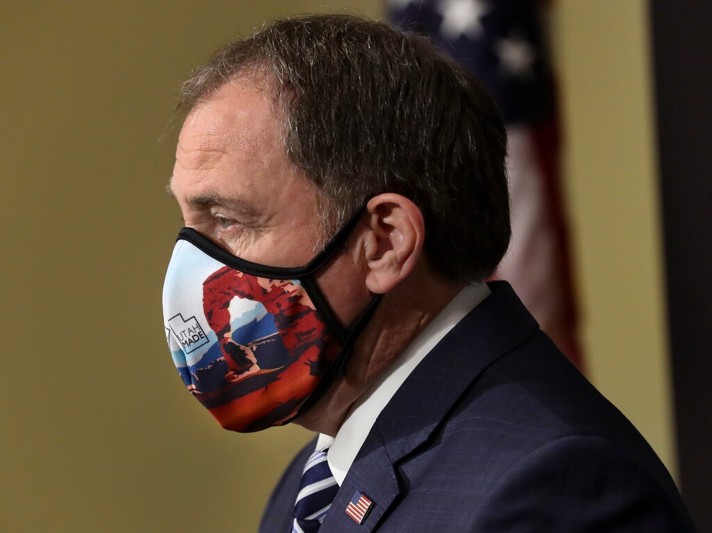(Steve Griffin  |  Deseret News, via pool) Utah Gov. Gary R. Herbert wears a Utah-made mask with a depiction of Delicate Arch on it as he begins to speak during the daily COVID-19 briefing at the Capitol in Salt Lake City on Tuesday, April 28, 2020.