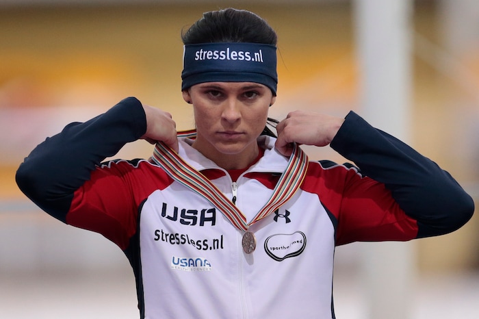 Brittany Bowe, of the United States, reacts wearing her bronze medal after failing to defend the title at women's 1000 meter race of the speedskating single distance World Championships in Kolomna, Russia, on Friday, Feb. 12, 2016. (AP Photo/Ivan Sekretarev)