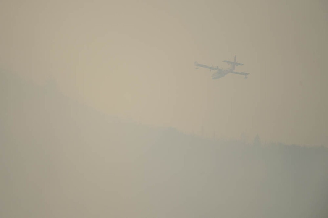 (Trent Nelson | The Salt Lake Tribune) The Coal Hollow Fire burns along Highway 6 in Utah County, Thursday Aug. 9, 2018.