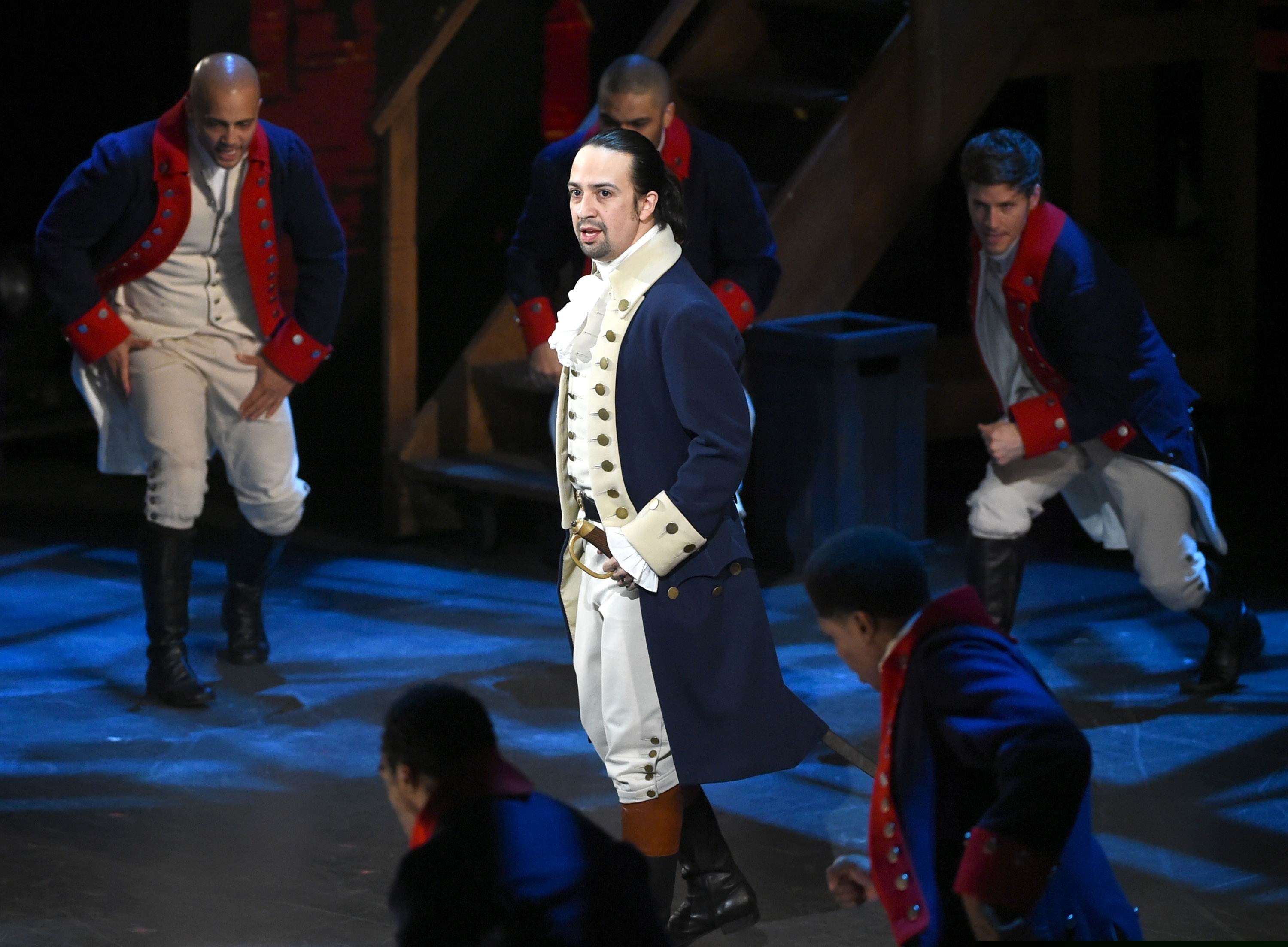 (Evan Agostini | Invision/AP, file) In this June 12, 2016, file photo, Lin-Manuel Miranda and the cast of "Hamilton" perform at the Tony Awards in New York. A movie version of the musical is now streaming on Disney+.