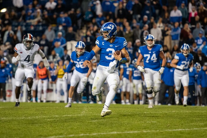 (Trevor Christensen | Special to The Tribune) Brigham Young University's Jaren Hall runs the ball against Virginia during the second half at LaVell Edwards Stadium on Saturday, Oct. 30, 2021, in Provo.