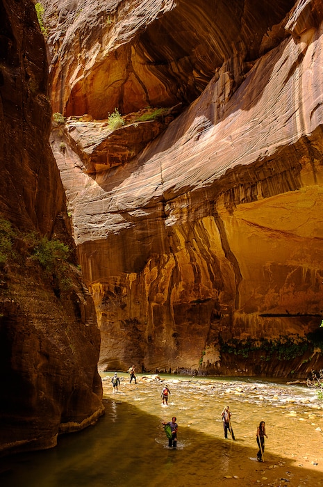(Trent Nelson  |  Salt Lake Tribune file photo) Hikers in the Narrows in Zion National Park in 2015.