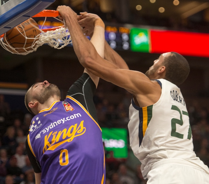 (Rick Egan  |  The Salt Lake Tribune)  Utah Jazz center Rudy Gobert (27) dunks the ball over Sydney Kings guard Isaac Humphries (0), in preseason basketball Utah Jazz vs.Sydney Kings, in Salt Lake City, Sunday, October 2, 2017.


