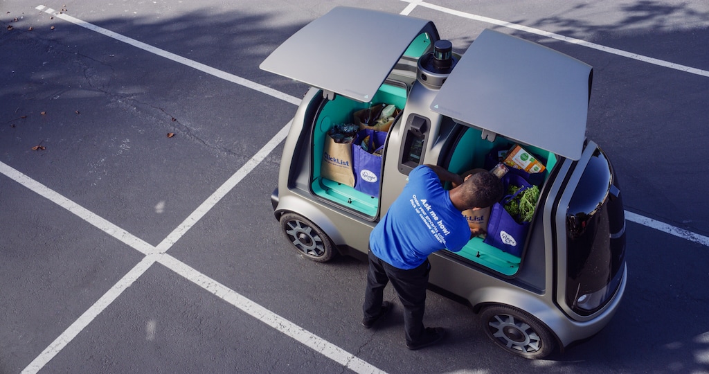 This undated image provided by The Kroger Co. shows an autonomous vehicle called the R1. Kroger will begin testing grocery deliveries using driverless cars outside of Phoenix. The grocery chain said the project will begin Thursday, Aug. 16, 2018, in Scottsdale, at a Fry's supermarket, which is owned by Kroger. The Toyota Prius will be used for the deliveries, manned by a human to monitor its performance. During phase two in the fall deliveries will be made by the R1 with no human aboard. (The Kroger Co. via AP)