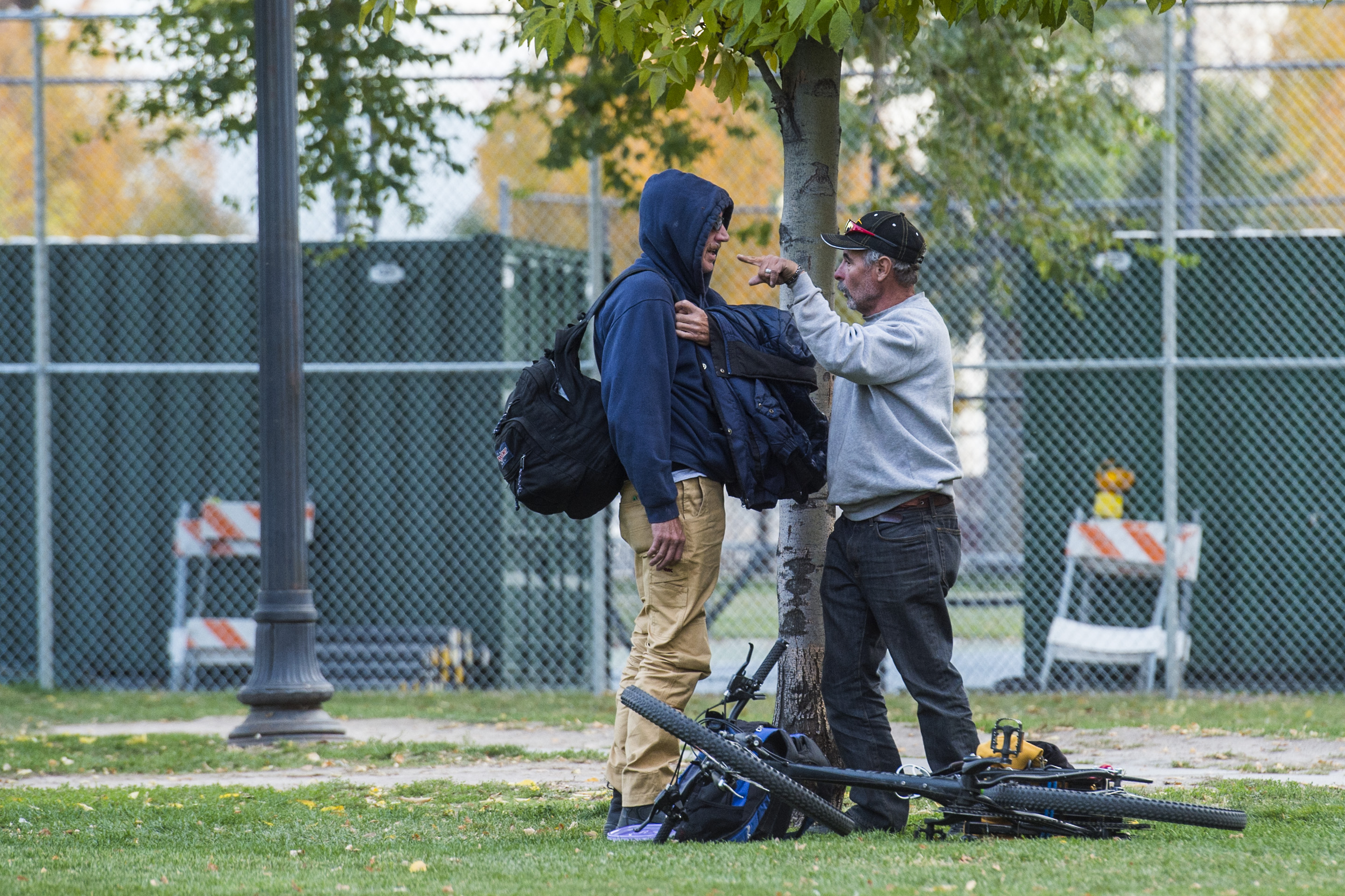 (Chris Detrick  |  The Salt Lake Tribune)  People in Pioneer Park in Salt Lake City Tuesday, October 17, 2017. 