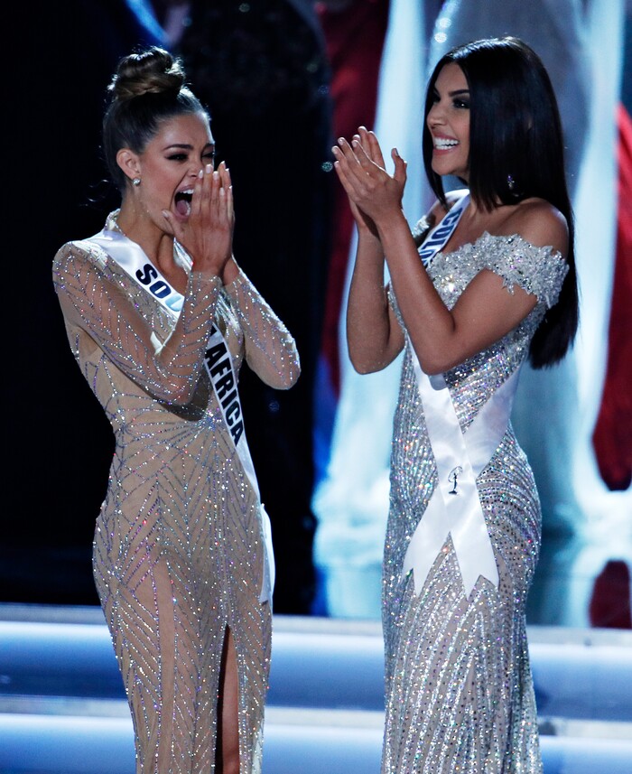 (John Locher | The Associated Press) Miss South Africa Demi-Leigh Nel-Peters, left, reacts as she was announced as the new Miss Universe at the Miss Universe pageant Sunday, Nov. 26, 2017, in Las Vegas. Miss Colombia Laura Gonzalez, right, is first runner up.