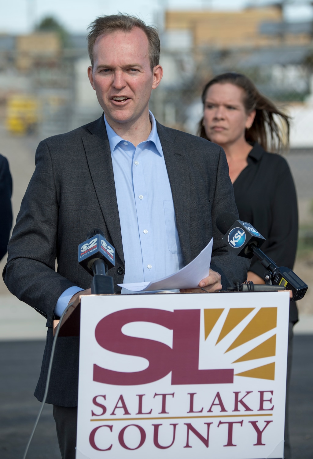 (Rick Egan  |  The Salt Lake Tribune)    Salt Lake County Mayor Ben McAdams speaks at a news conference in the warehouse area of the old Camp Kearns Army Air Force Base, as Salt Lake County celebrates the completion of a $1.9 million project to pave roads and increase business opportunities in the area. Thursday, Aug. 30, 2018.