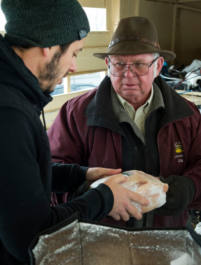 (Leah Hogsten | The Salt Lake Tribune) Salt Lake City butcher Philip Grubisa, owner of Beltex Meats purchases chickens from Dale Batty to cut up and sell in his store. Dale Batty raises hormone-free chickens and sells them at the Salt Lake City farmer's markets. Utah's agriculture rules force Batty to sell chickens "whole" Ñ not cut, even though that's what his customers request and it would be more profitable. Batty is working with his state representative to pass a Food Freedom Bill, which could help remedy the situation and will likely be introduced during the 2018 legislative session.