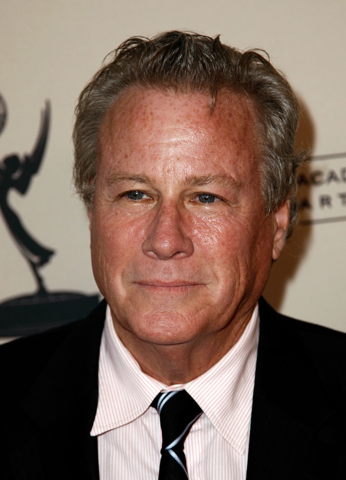 FILE - In this Sept. 12, 2011 file photo, actor John Heard arrives at Academy of Television Arts and Sciences Producers Peer Group celebration of the 63rd Primetime Emmy Awards in Los Angeles. Heard, best known for playing the father in the “Home Alone” movie series, has died. He was 72. His death was confirmed by the Santa Clara Medical Examiner’s office in California on Saturday, July 22, 2017. (AP Photo/Matt Sayles)