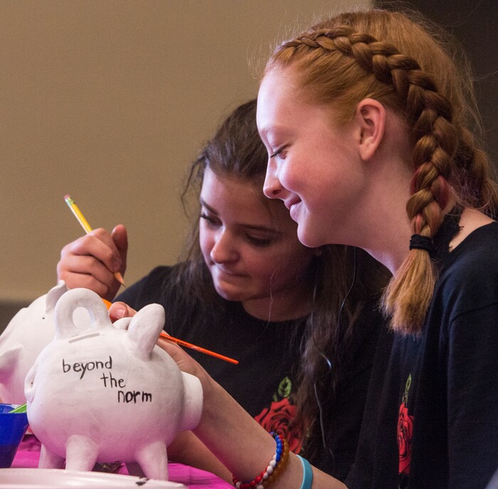 (Rick Egan  |  The Salt Lake Tribune)   Morgan Eerdmann and Daytona Linza paint piggy banks at the Salt Lake Tribune Home & Garden show, at the Mountain America Expo Center in Sandy, Saturday, March 10, 2018. 
