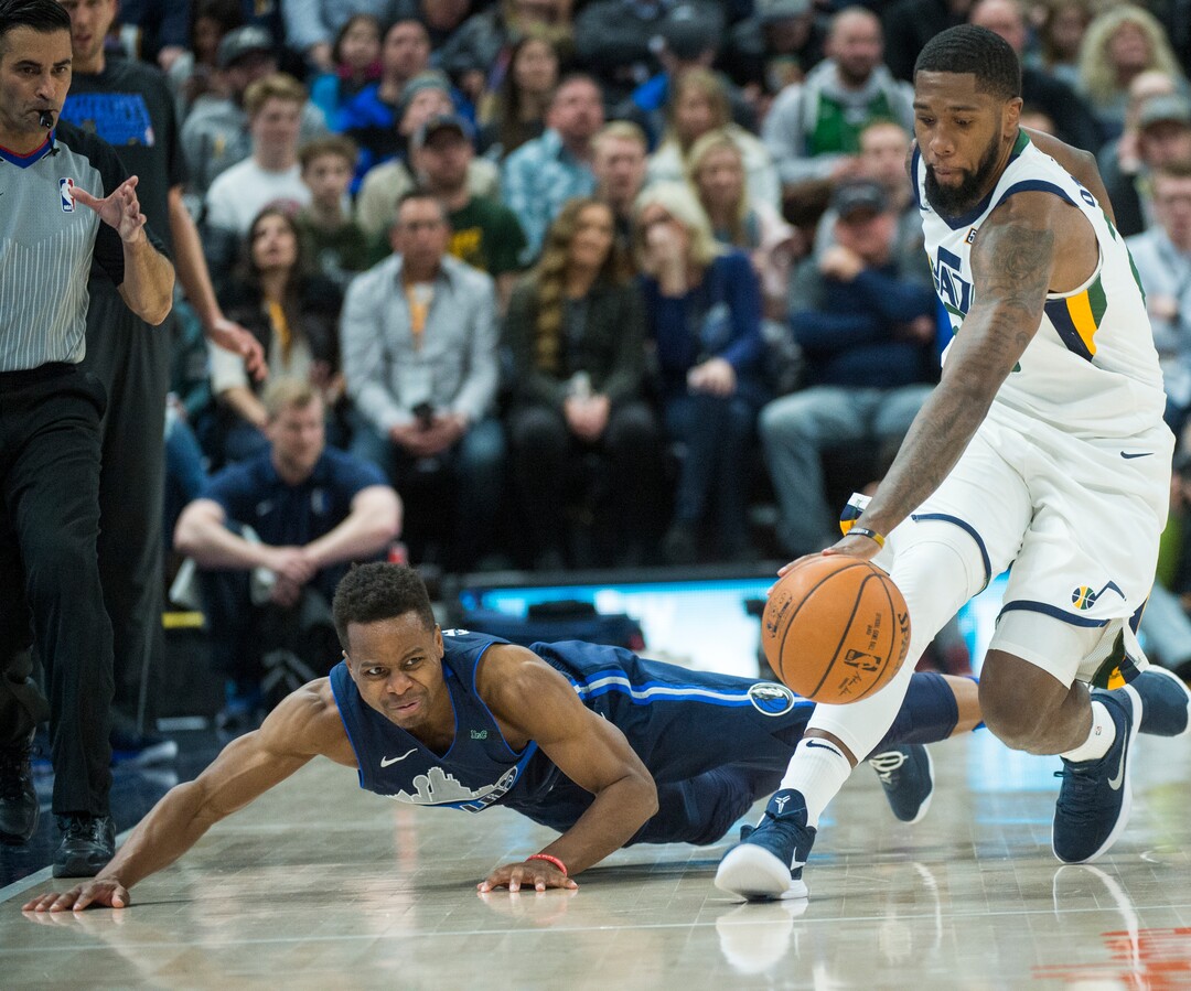 (Rick Egan  |  The Salt Lake Tribune)    Utah Jazz forward Royce O'Neale (23) seals the ball from Dallas Mavericks guard Dennis Smith Jr. (1), in NBA action between Utah Jazz and Dallas Mavericks in Salt Lake City, Saturday, Feb. 24, 2018.