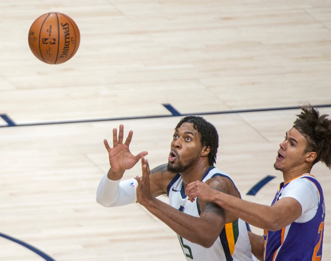 (Rick Egan | The Salt Lake Tribune) Utah Jazz forward Derrick Favors (15) waits for a pass, as Phoenix Suns forward Cameron Johnson (23) defends, in preseason NBA action between Utah Jazz and Phoenix Suns at Vivint SmartHome Area, on Saturday, Dec. 12, 2020.