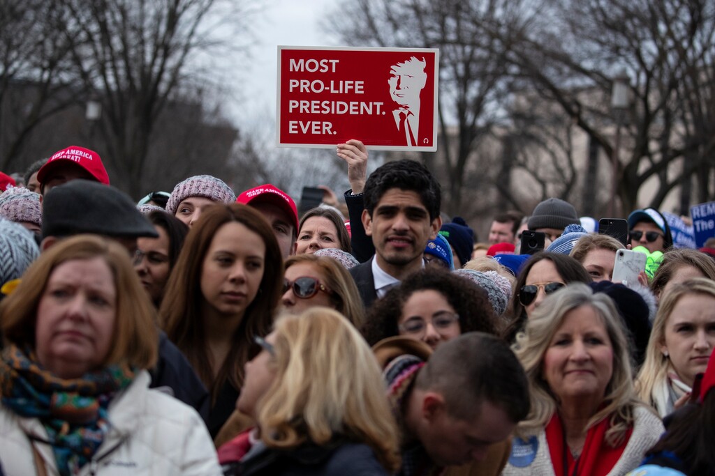FILE - In this Jan. 24, 2020, file photo, supporters listen as President Donald Trump speaks during the annual "March for Life" rally on the National Mall in Washington. (AP Photo/ Evan Vucci, File)