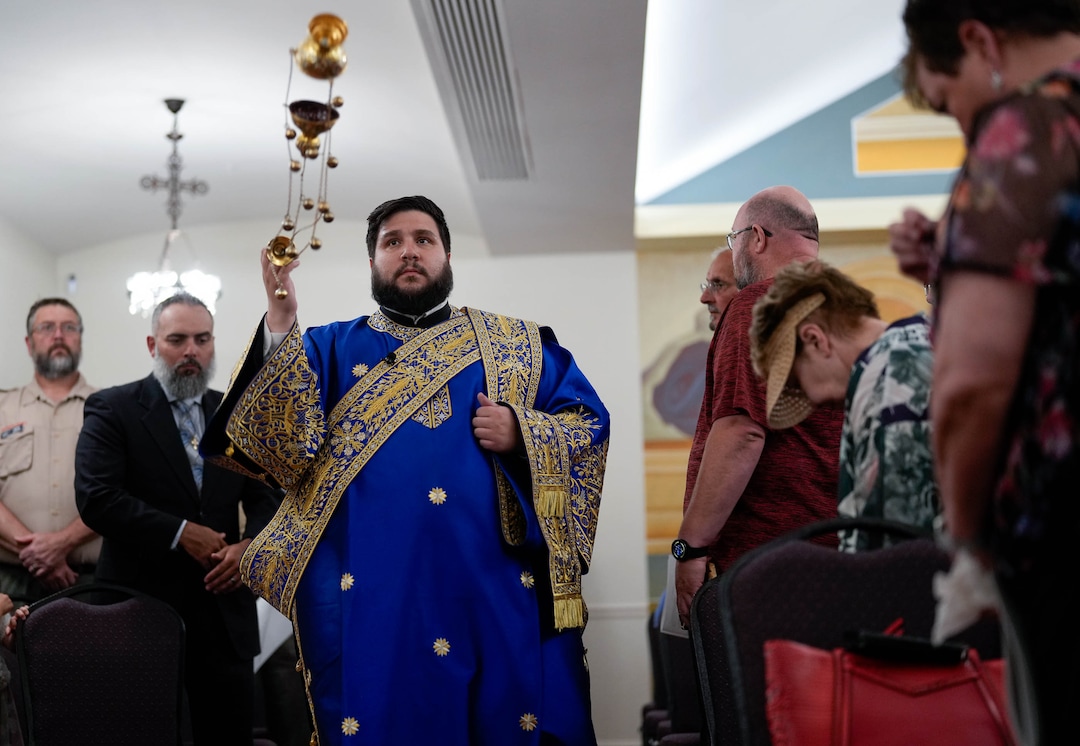 (Francisco Kjolseth  |  The Salt Lake Tribune) Dionysios Papiris swings the censor as he blesses the newly remodeled space of St. Anna Greek Orthodox Church in Sandy on Saturday, July 13, 2024.