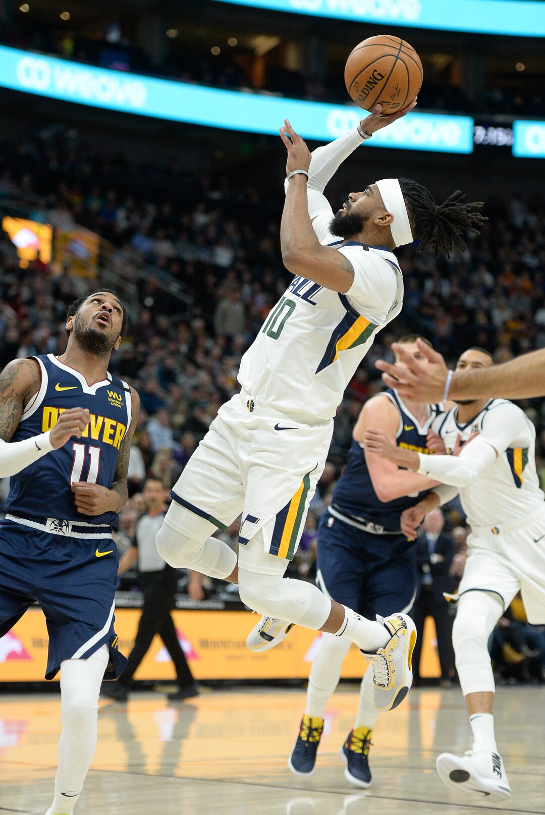 (Francisco Kjolseth  |  The Salt Lake Tribune) Utah Jazz guard Mike Conley (10) sails one in as the Utah Jazz host the Denver Nuggets in their NBA basketball game at Vivint Smart Home Arena in Salt Lake City on Wednesday, Feb. 5, 2020.
