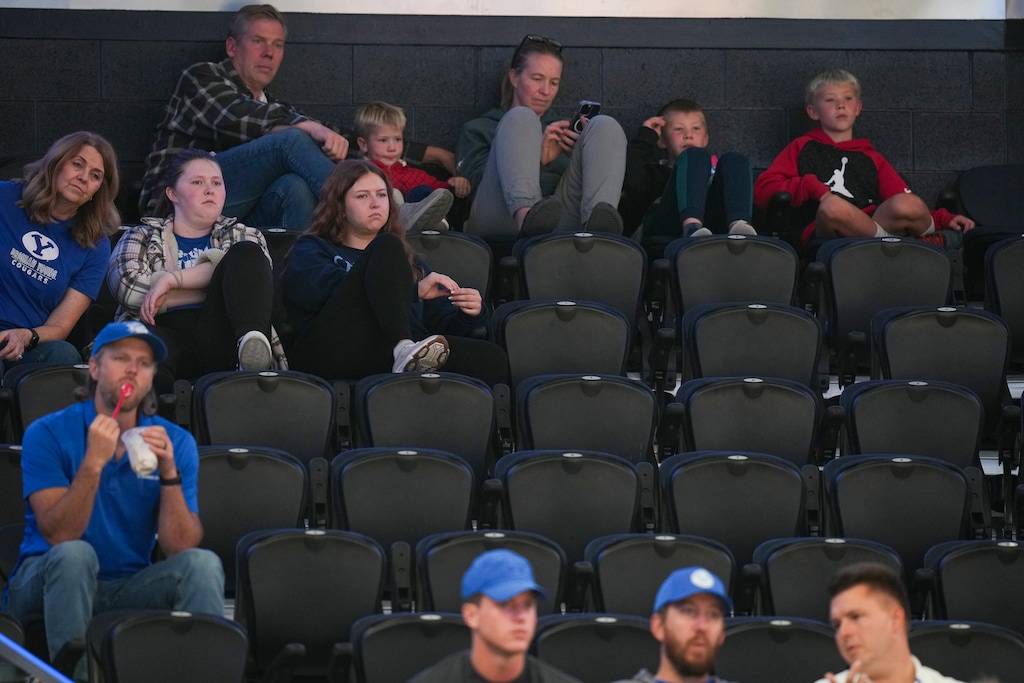(Bethany Baker  |  The Salt Lake Tribune) Fans sit in the stands during the game between the BYU Cougars and the North Carolina Tar Heels at Delta Center on Friday, Oct. 24, 2025.