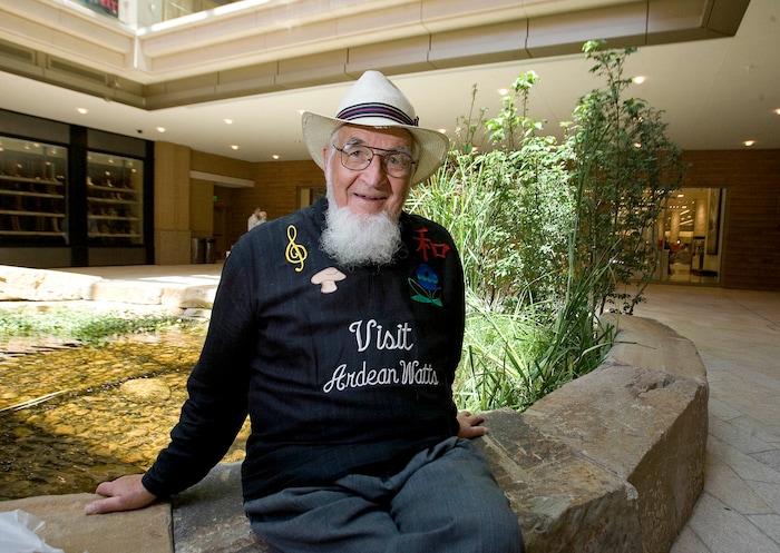 Paul Fraughton / Salt Lake Tribune
Former assistant director of the Utah Symphony, Ardean Watts wears a shirt  with the message," Visit Ardean Watts", inviting  visitors to the mall to engage with him  in conversation, on May 14, 2012. Watts was a pianist who was a former associate conductor of the Utah Symphony and a University of Utah music professor. He died July 21, 2017. Watts was 89.