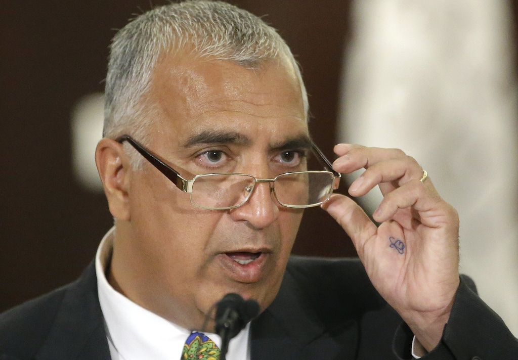 FILE - In this Sept. 30, 2014, file photo, Salt Lake County District Attorney Sim Gill speaks to reporters during a news conference in Salt Lake City. Gill has filed misdemeanor assault charges against two Wyoming men accused of attacking two Salt Lake City men because they were gay. Gill says Utah's broadly-worded hate crimes law is too difficult to apply and includes no LGBT protections, preventing him from pursing tougher charges in the 2014 attack. (AP Photo/Rick Bowmer, File)
