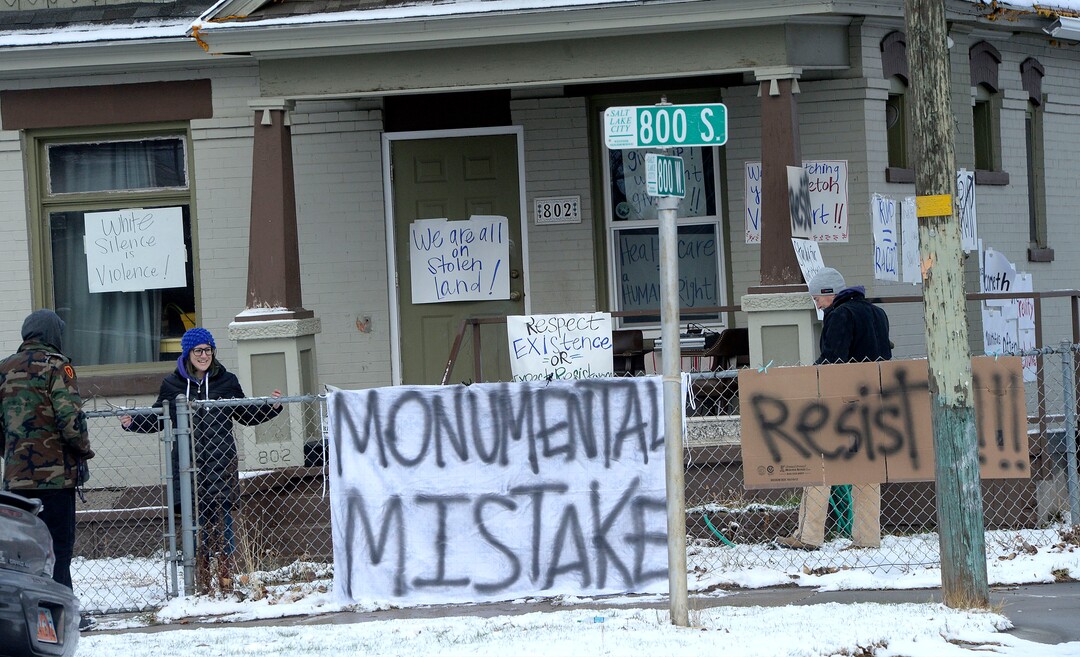 ((Al Hartmann  |  The Salt Lake Tribune) 	House near LDS Welfare Square at 800 S. 800 W. prepares for President Trump's motorcade with protest signs Monday Dec. 4.  Trump is to visit Welfare Square with leaders of LDS Church before heading to the Utah Capitol where he is expected to shrink Bear's Ears and Grandstaircase National Monuments. 